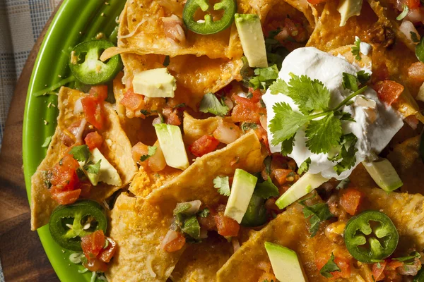 Homemade Unhealthy Nachos with Cheese and Vegetables — Stock Photo, Image