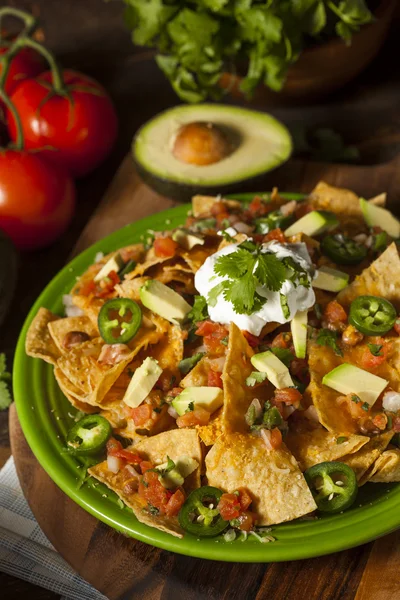 Homemade Unhealthy Nachos with Cheese and Vegetables — Stock Photo, Image