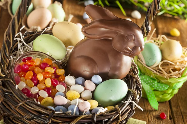 Chocolate Easter Bunny in a Basket — Stock Photo, Image