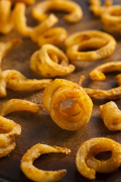 Pittige gekruide krullend frietjes — Stockfoto