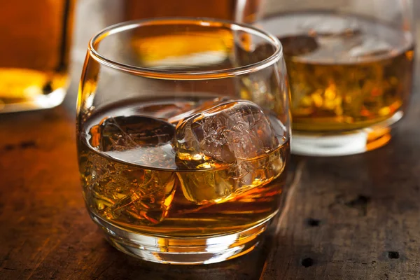 Alcoholic Whiskey Bourbon in a Glass with Ice — Stock Photo, Image