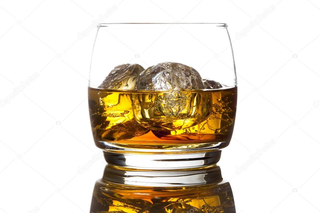 Alcoholic Whiskey Bourbon in a Glass with Ice