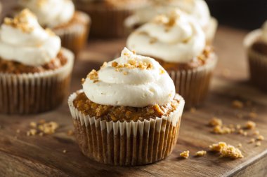 Homemade Carrot Cupcakes with Cream Cheese Frosting clipart