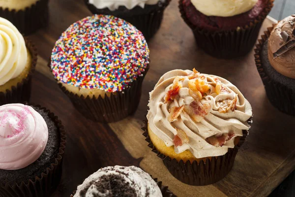 Assorted Fancy Gourmet Cupcakes with Frosting — Stock Photo, Image