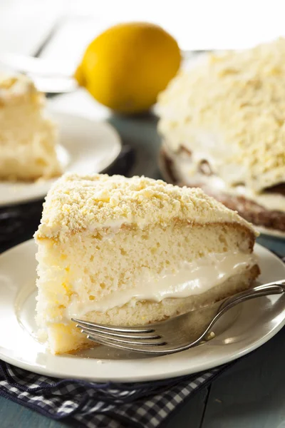 Hemgjord citron tårta med grädde glasyr — Stockfoto