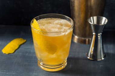 Boozy Refreshing Bourbon Gold Rush Cocktail with Lemon clipart