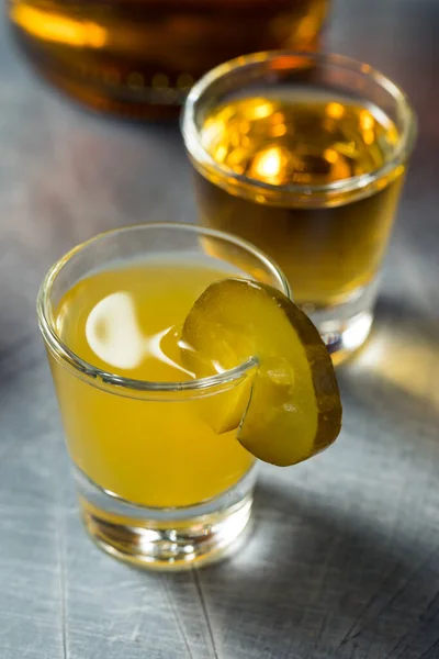 Boozy Cold Pickleback Shot Cocktail Irish Whiskey — стокове фото