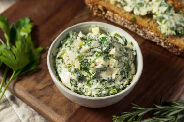 Healthy Homemade Herb Butter and Bread with Rosemary and Parsley clipart