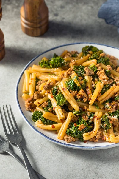 Homemade Kale and Sausage Caserecci Pasta with Cheese