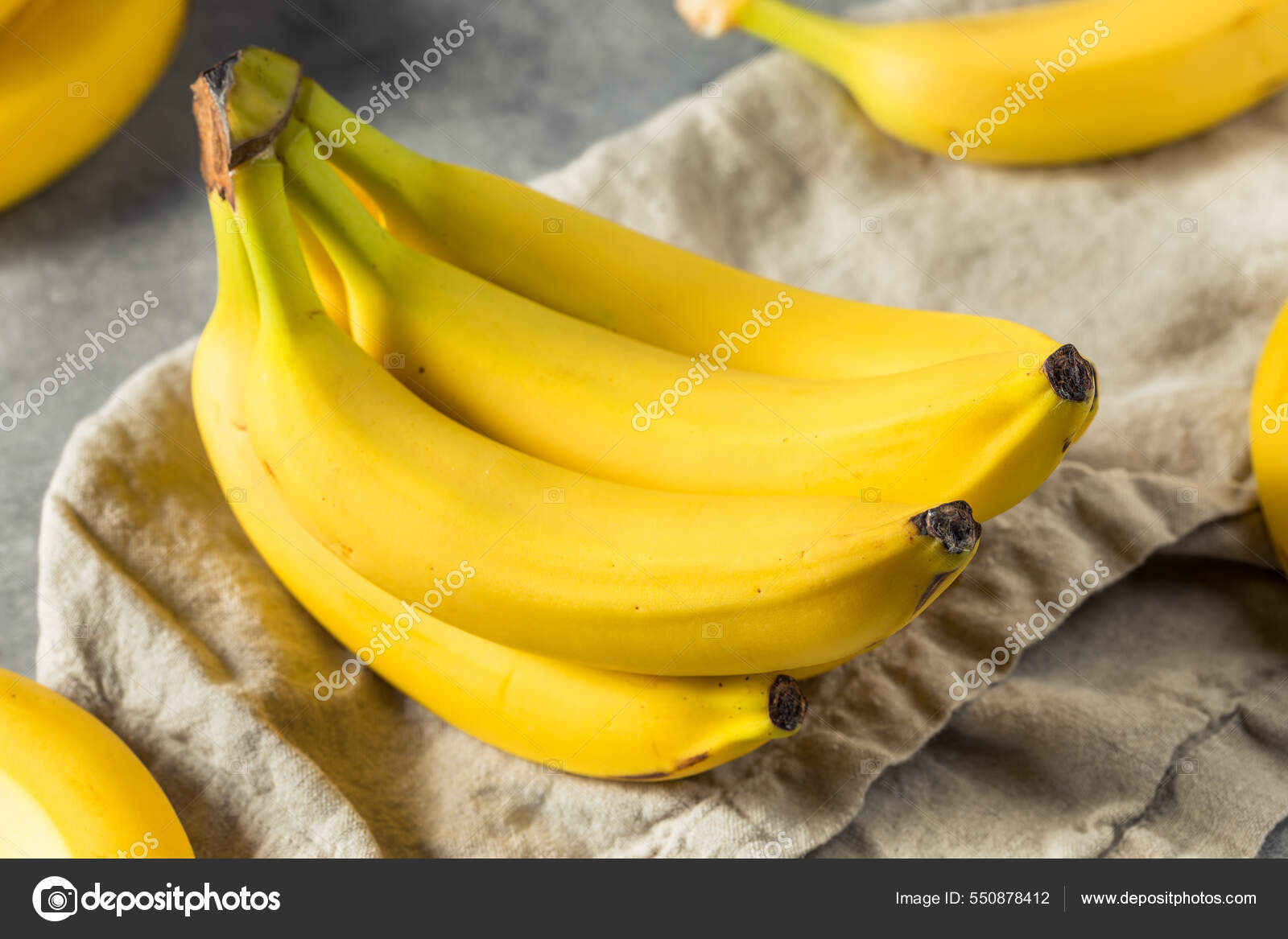 https://st.depositphotos.com/1692343/55087/i/1600/depositphotos_550878412-stock-photo-organic-raw-yellow-banana-bunch.jpg