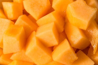 Raw Orange Organic Cantaloupe Melon Cut into Cubes