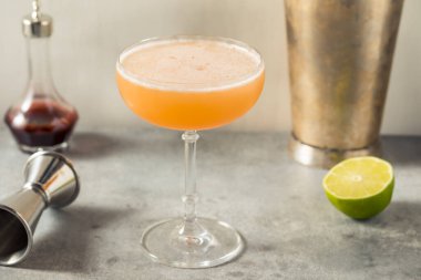 Boozy Refreshing Allspice Bourbon Lions Tail Cocktail in a Coupe