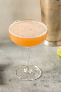 Boozy Refreshing Allspice Bourbon Lions Tail Cocktail in a Coupe