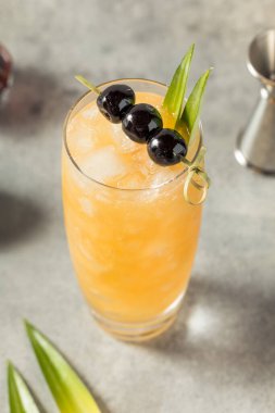 Cold Refreshing Three Dots and a Dash Cocktail with Rum and Pineapple