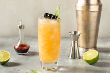 Cold Refreshing Three Dots and a Dash Cocktail with Rum and Pineapple