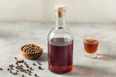 Boozy Allspice Dram Liquor in a Glass