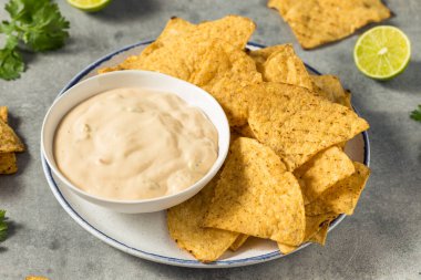 Homemade Creamy White Queso Dip with Tortilla Chips