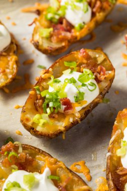 Homemade Loaded Crispy Potato Skins with Sour Cream and Bacon
