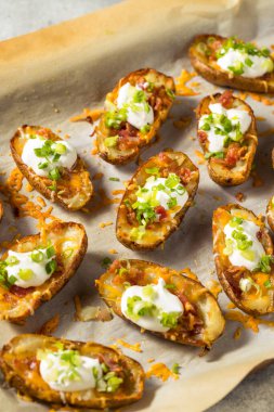 Homemade Loaded Crispy Potato Skins with Sour Cream and Bacon