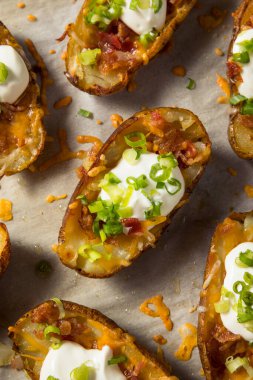 Homemade Loaded Crispy Potato Skins with Sour Cream and Bacon