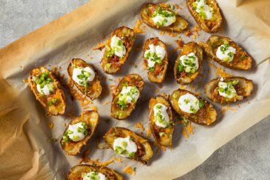 Homemade Loaded Crispy Potato Skins with Sour Cream and Bacon