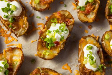 Homemade Loaded Crispy Potato Skins with Sour Cream and Bacon