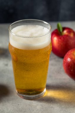 Boozy Refresing Cold Hard Apple Cider in a Pint Glass