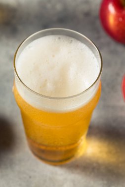 Boozy Refresing Cold Hard Apple Cider in a Pint Glass