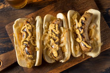 Homemade Beer Bratwursts with Onions and Mustard clipart