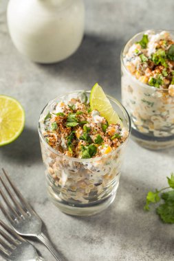 Homemade Corn Elote Esquites in a Cup with Mayo and LIme