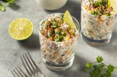 Homemade Corn Elote Esquites in a Cup with Mayo and LIme