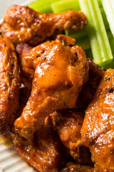 Homemade Spicy Buffalo Chicken Wings with Celery and Blue Cheese