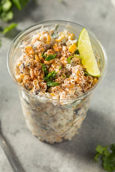 Homemade Corn Elote Esquites in a Cup with Mayo and LIme