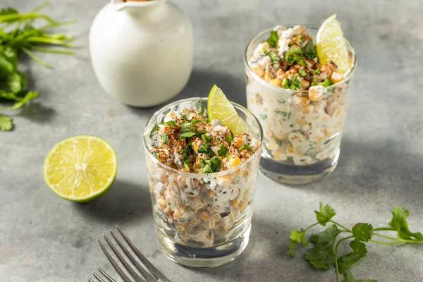 Homemade Corn Elote Esquites in a Cup with Mayo and LIme