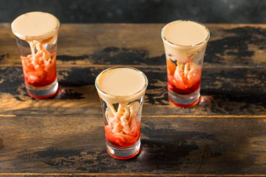 Boozy Halloween Brain Hemorrhage Shot Cocktail with Peach and Grenadine