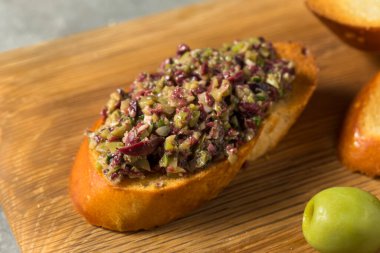 Homemade Mixed Olive Tapenade Appetizer with Toasted Bread