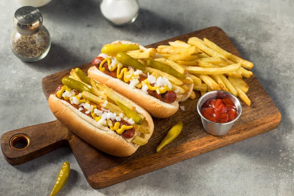 Homemade Chicago Style Depression Dog with Fries Mustard Peppers and Onion