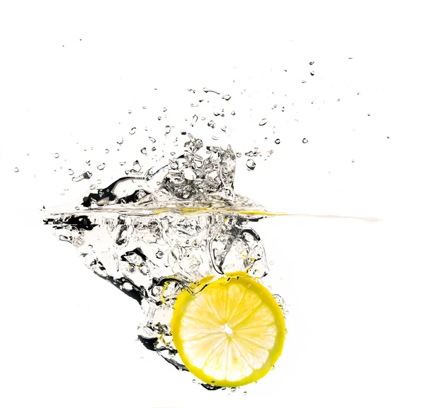 Fresh lemon slice splash — Stock Photo, Image