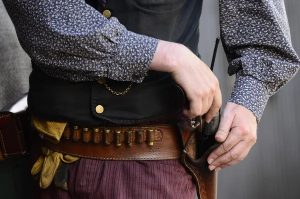 Cowboy and gun — Stock Photo, Image