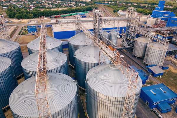 Grain storage in large silos aerial view. Silo with grain. Grain storage tank view from above