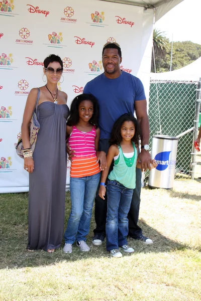 Nicole Murphy & Michael Strahan & hennes barn — Stockfoto