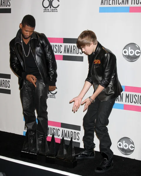 Usher, Justin Bieber — Stockfoto