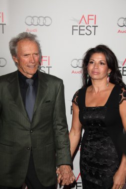 Clint Eastwood and wife Dina Ruiz clipart