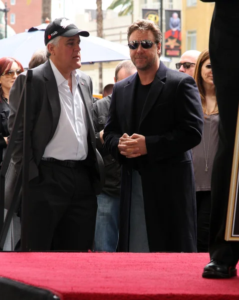 Jay leno och russell crowe — Stockfoto