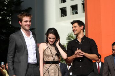 Robert pattinson, kristen stewart ve taylor lautner
