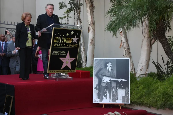 Maria Elena Holly, Gary Busey — Stockfoto