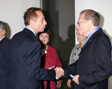 Carmen Puliafito, Larry King