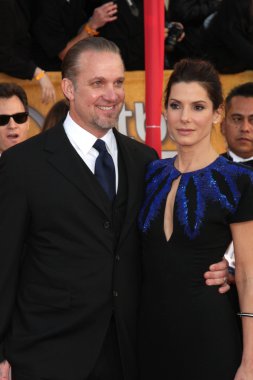 Sandra Bullock & husband Jesse James clipart