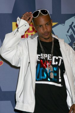 T.I.