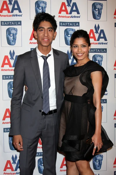 Dev Patel, Freida Pinto — Stockfoto